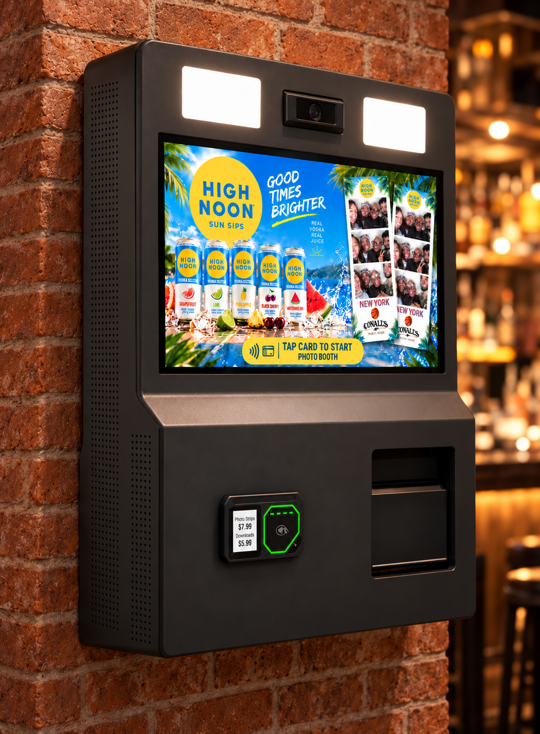 Illustrative idle-screen ad on a wall-mounted photo booth against a brick wall; the sample brand is High Noon.